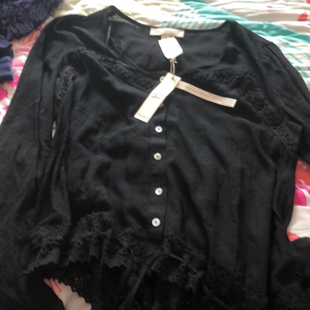 One of a kind black shirt